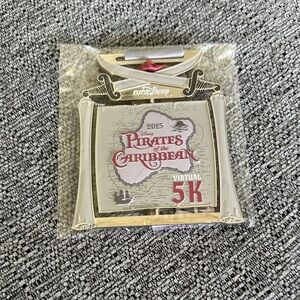 Disney Pirates of the Caribbean 5K Medal with Red and Silver Accents